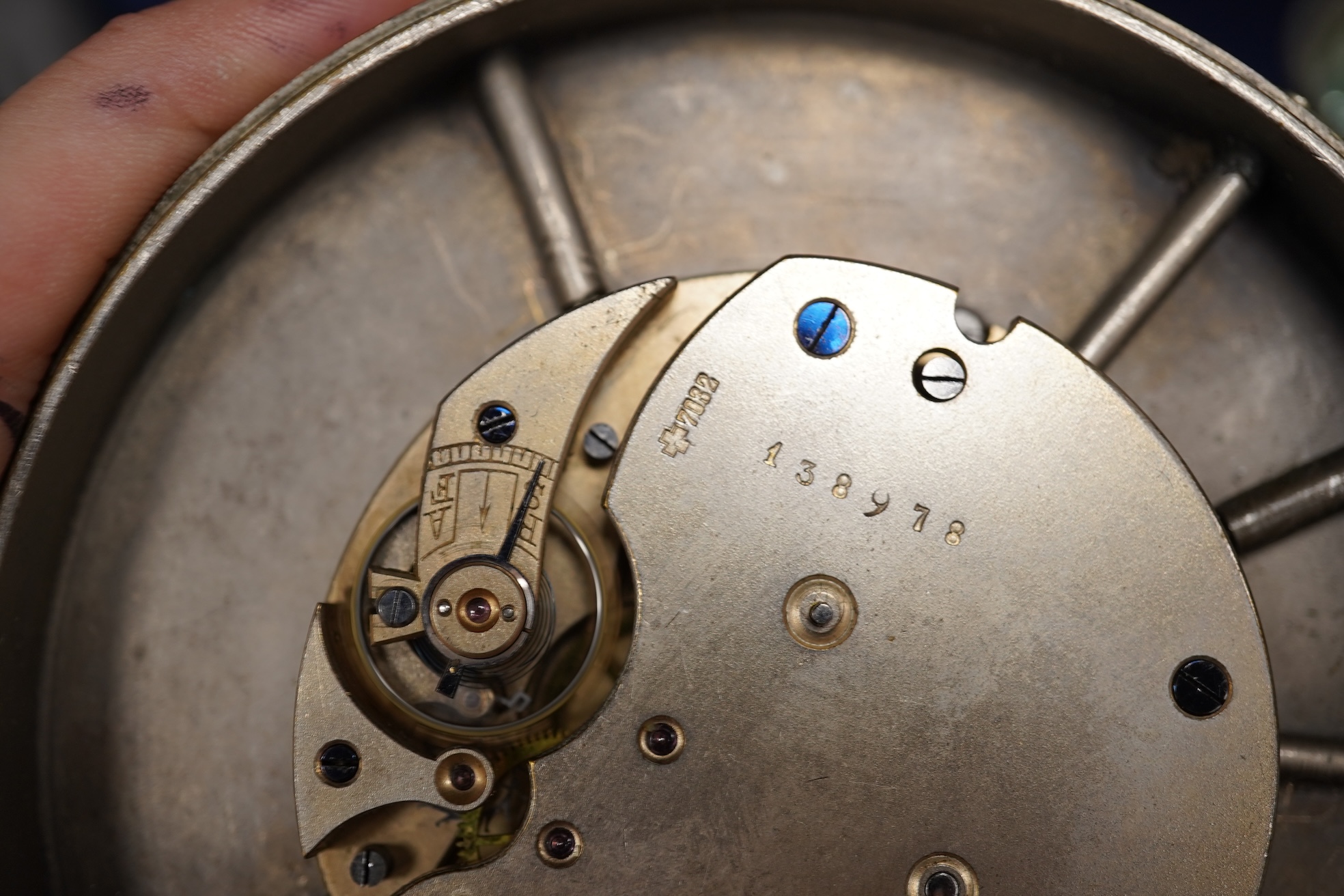 A large oversized spherical glass encased desk timepiece, with four subsidiary dials, 16cm